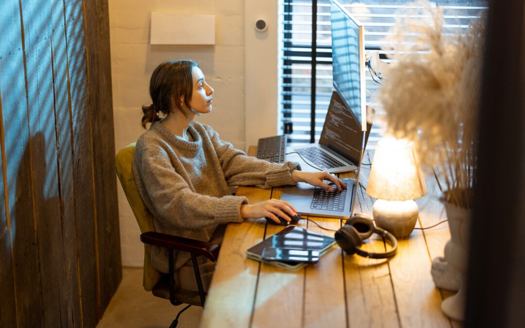 Woman works from cozy home office