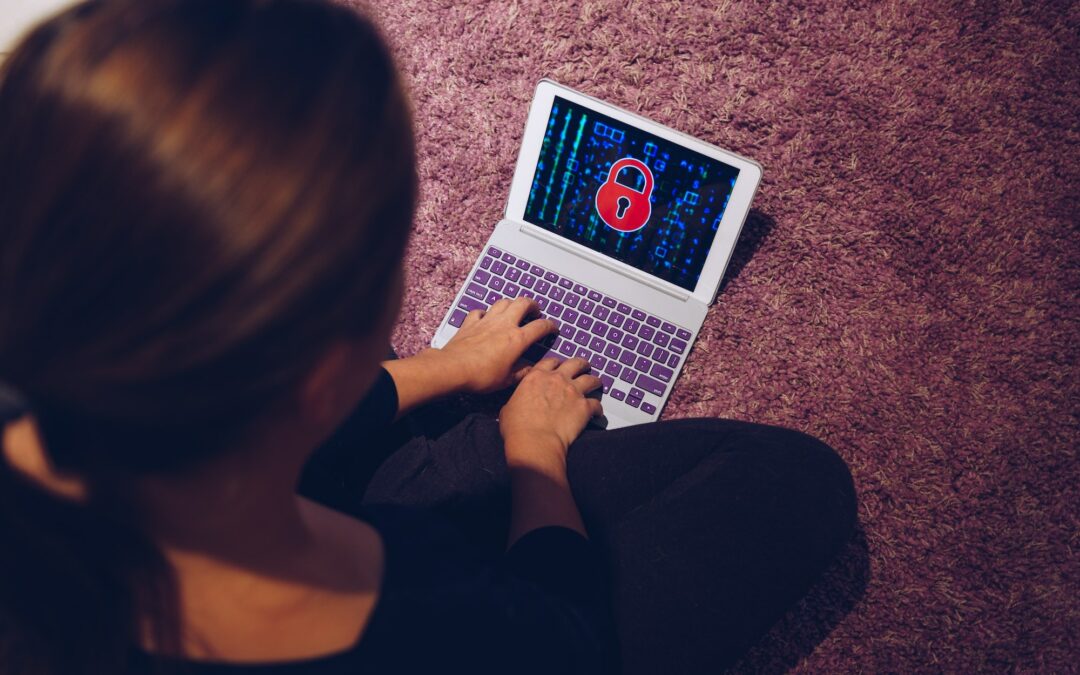 Female woman typing on locked smart device pad attacked by ransomware virus